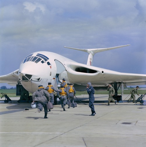 A Handley Page Victor bomber crew on quick reaction alert (QRA) scramble their aircraft for a mock n