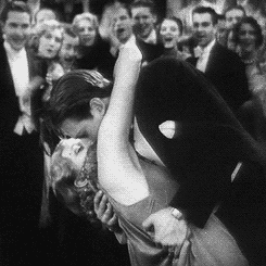 matineemoustache:Douglas Fairbanks Jr. kissing in the style of John Gilbert, with a Greta Garbo look