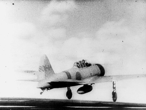 Sailors cheer as planes take off from a carrier to attack PearlHarbour (December 7th,1941).Japanese 