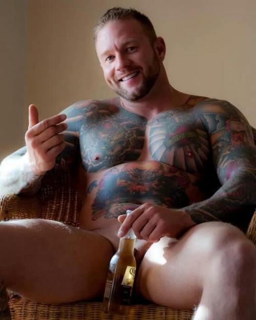 Muscular, great smile and awesome ink work adult photos