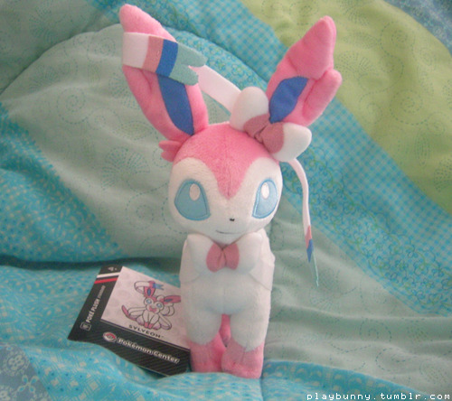 eeee i got a few new Sylveon things today ovothe top picture is a limited edition
