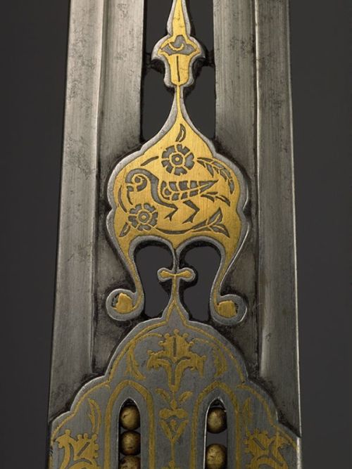 art-of-swords:  Ceremonial Dagger Dated: 16th century - 17th century Culture: Indian and Iranian Medium: carved jade and Khorássán steel Measurements: blade length 19.6 cm Source: Copyright © 2015 The Wallace Collection 