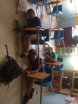 captainobsessed:  rawdi-kun:  Today I got my friends to help me turn the whole class sideways and sit in the chairs like we normally would for April Fools and wait for our teacher to walk in. We also flipped her desk, chair and computer. The faces on