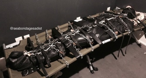 seabondagesadist:@lostinsea88 came over for some bondage fun. He was unaware of what I had in mind for him. I strapped him in the sleepsack, strapped and chained down to the cot. It was my intention to simply give him a long storage ride. His cock at