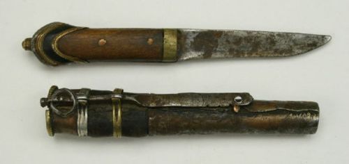 art-of-swords:  Tibetan Dagger Dated: beginning of the 20th century Medium: copper, brass, iron Measurements: 21 cm overall length in sheath  Source: Copyright © 2014 Auction Flex 