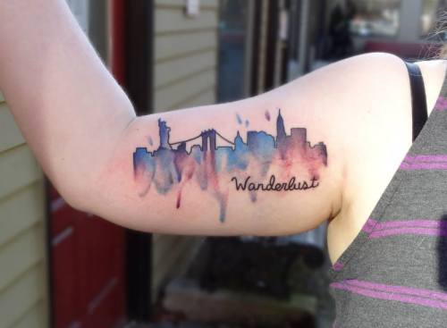 fuckyeahtattoos:  NYC Skyline tattoo in watercolor, done by Emily Kaul at Opal Ink in Portland OR. 