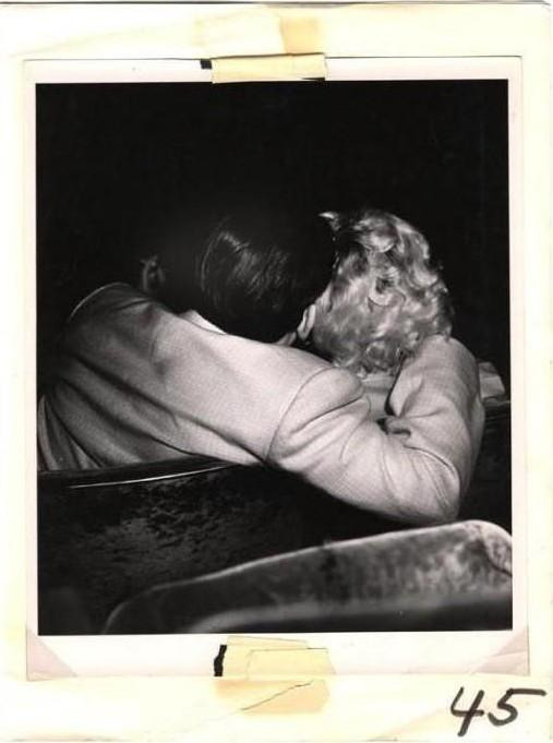 fuckyeahvintage-retro:  Lovers at the movies, 1943 © Weegee 