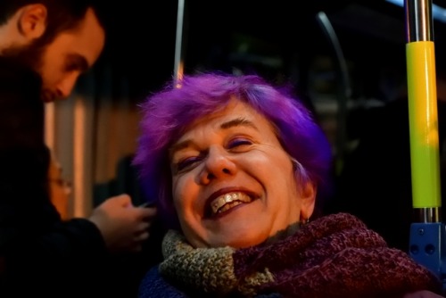 A stranger on a streetcar … and it looks like she has a diamond in one of her teeth; in Jerus