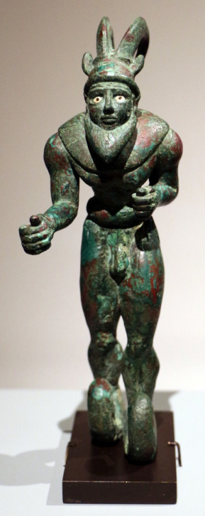 Proto-Elamite statuette of a horned, striding figure.  Artist unknown; ca. 3000-2800 BCE.  Now in th