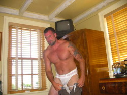 manlydadchaser63:  …walked in on Dad, taking off his shorts…he’s wearing a jockstrap… 