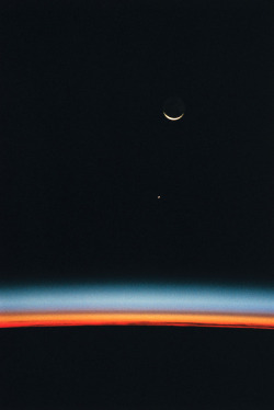 astronomyblog:  This scene, captured with a 35mm camera from inside the Space Shuttle Endeavour, shows Jupiter rising above the airglow over Earth’s horizon. The crescent Moon is at top frame.Credit: NASA