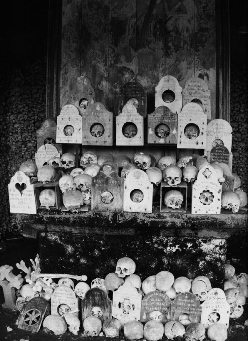 mortisia:  St Hilaire Cemetery - By no means the most extravagant collection of bones on this list, the St Hilaire cemetery in Marville, France gets its beauty from simplicity. It is unique in that may of the skulls are housed in small cabinets inscribed
