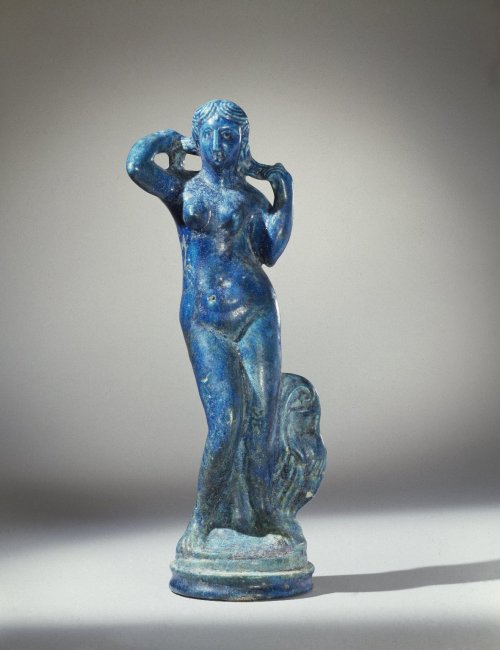 mini-girlz:Statuette of Aphrodite Anadyomene MEDIUM: Faience DATES: late 2nd century B.C.E. PERIOD