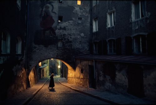 natgeofound:  Saint Christopher decorates an archway over a cobblestone street in Bavaria, Germany, March 1974.Photograph by George F. Mobley, National Geographic 