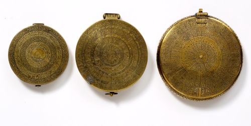 touba:Brass qibla compasses, used to establish the direction one should turn towards during prayers 