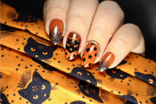 Day 7 of the 13 Days of Halloween: When you want your nails to match your mask.Products Used:Maniolo