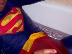 supermanfetish:  Superman tricked in pool of liquid kryptonite.