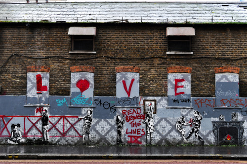 Love and Dotmaster art on a derelict building, Croydon