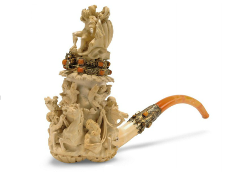 A carved meerschaum pipe mounted with silver and coral. Austria, circa 1875.