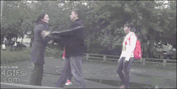 ninjaeyecandy:  4gifs:  Bully messes with karate champ. [video]  The source video is very, very worth watching. A few things to point out: The young woman in the dark coat is continually trying to escape from the man. She has spoken to him, she’s pulled