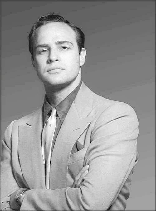wehadfacesthen: Marlon Brando in a publicity photo for Guys and Dolls, 1955