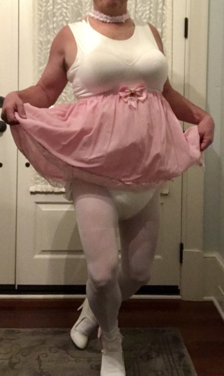 bulkydiaperboy:Do you like my new pink sissy skirt as much as I do. And my new heels.  Yummy. Sissy 