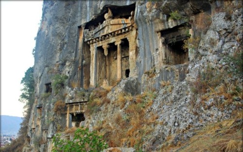 Turkey - Lycian Tombs are cut out of the rock face at Fethiye