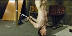 VIDEO: Twink suspended upside down handcuffed dungeon sex slave