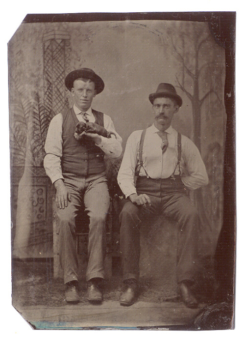 tuesday-johnson:  ca. 1860s-90s, [tintype portrait of two men posed with a tiny puppy] via Capitol G