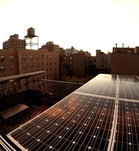 New York Contemporary DeckMid-sized Modern Rooftop Deck Design Idea With An Awning