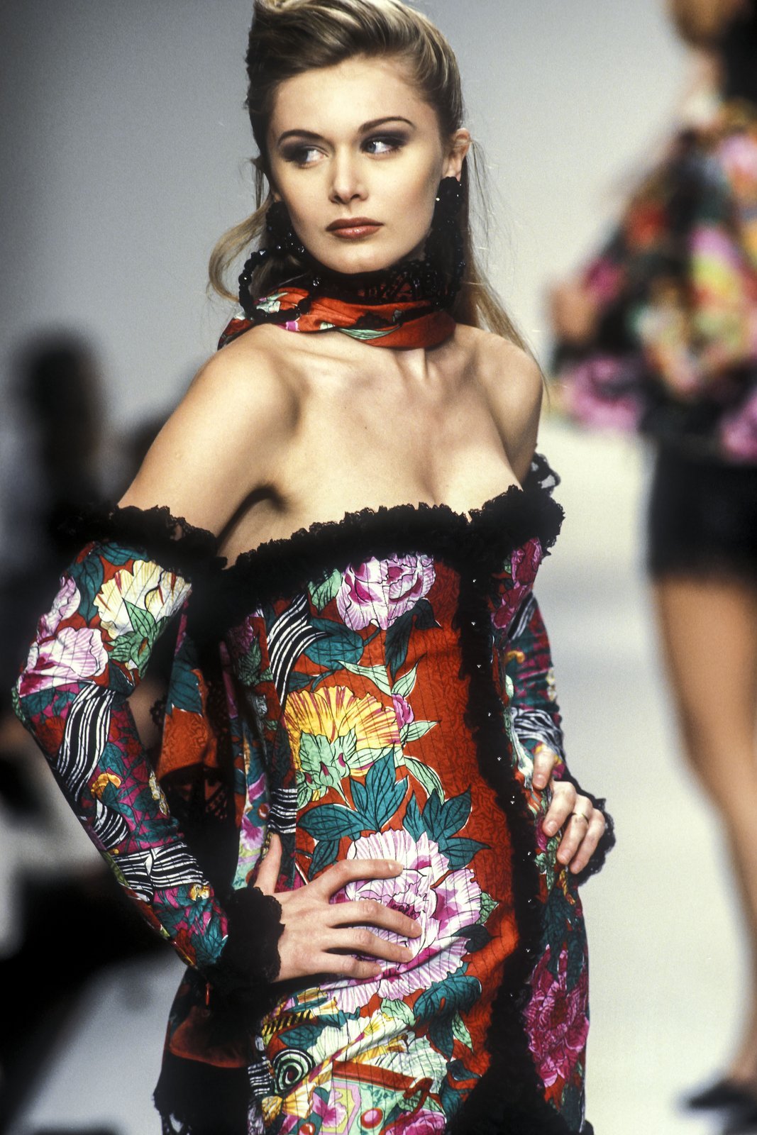 A model walks in the Louis Feraud Spring 1999 Couture Runway Show