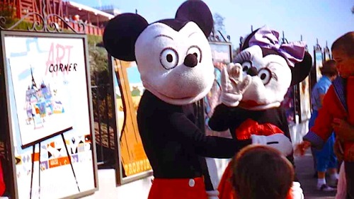 Mickey and Minnie greet (more accurately scare) guests at Disneyland’s main entrance in this p