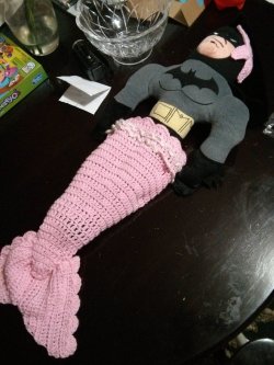 daily-superheroes:  Pregnant wife crocheted a photo prop for our unborn child. Batman became the model. I present Mer-bat!http://daily-superheroes.tumblr.com/