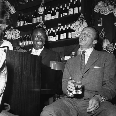 foreverfranksinatra:  Frank photographed with Nat King Cole at Villa Capri, 1955.