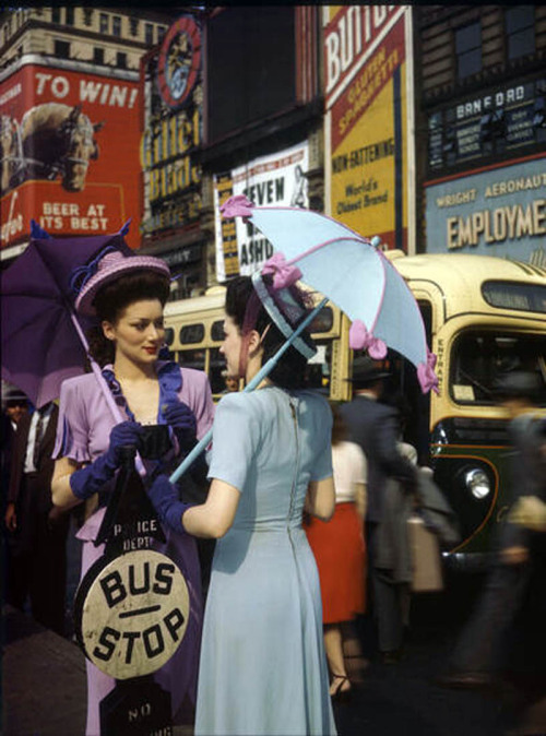 A fashion shot of two models at a bus stop in Times Square, ca. 1945.Photo: Look magazine via MCNY