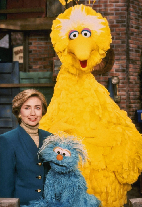 toughpigs:Hillary Clinton and Sesame Street’s Big Bird, Oscar, and Rosita.