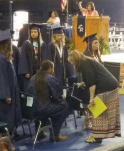 thecuriousviolet:  gaagige-binesi:  ndndoll:  El Reno High School, who has an ‘Indian’ mascot, humiliated a young Native man, Jonathan Birdshead, at his graduation. They told him he couldn’t wear his beaded cap, in front of everyone. The woman pictured