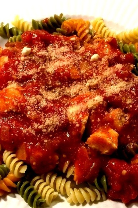 Chicken Bolognaise - Cuisine - Italian With Freshly Grated Parmesan Cheese, Rotini Pasta Is Topped With