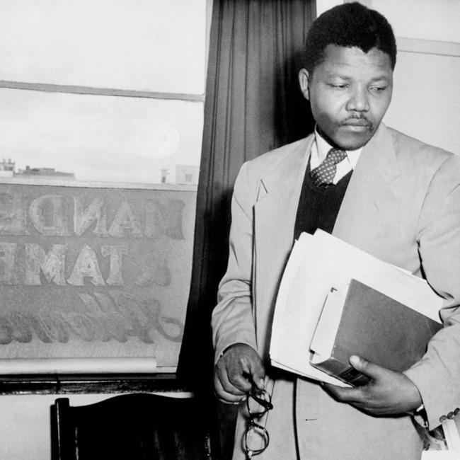 onceiwentblack:prepaidafrica:1. Nelson Mandela in 1952 at the law office he opened