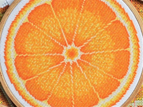 I thought an orange cut in half would make a good cross stitch. I think I was right! 