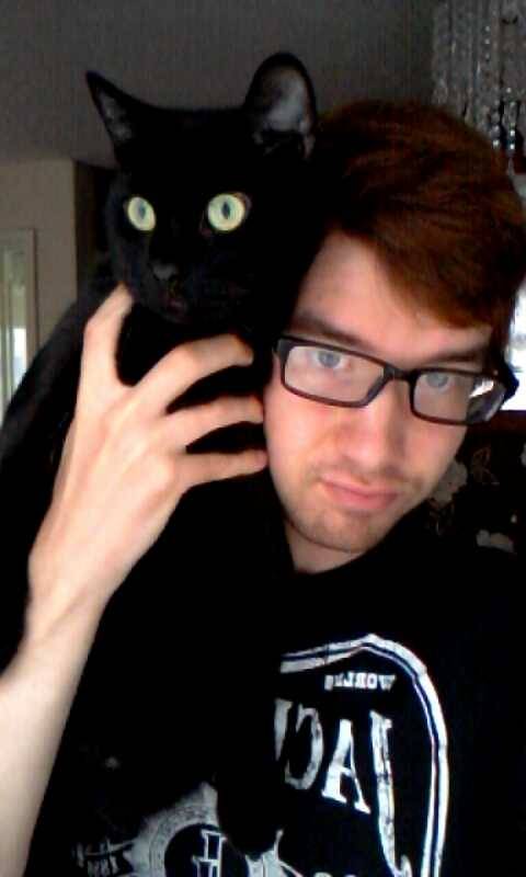 sombre-songbird:Me and my cat ,Oscar, who hates me (but loves me at night when theres