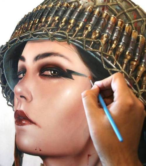 Studio shot of Brian M. Viveros hard at work creating new paintings for his upcoming solo exhibition