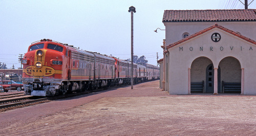 qstation:   	The “Chief” @ Monrovia by Kevin Cavanaugh    	Another view of the short-lived “Chief” under the Amtrak banner, this time at Monrovia, CA. Eastbound train #20,  rolls east past the closed Monrovia, CA depot on July 3rd, 1972, just