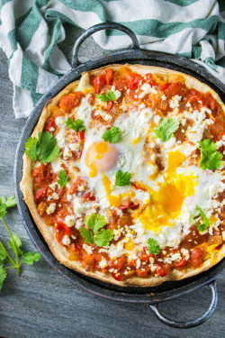 foodffs:  You don’t have to be hungover to enjoy this delicious hangover cure from Port and Fin. Spicy tomato sauce, creamy goat cheese and oozy eggs.  GET THE RECIPEReally nice recipes. Every hour.Show me what you cooked!  I neeeed