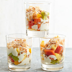 bhgfood:  Tropical Fruit Breakfast Parfaits: For a tropical take on your morning parfait, top oats, coconut, sunflower kernels, and mango on tangy lime yogurt. (BHG.com)