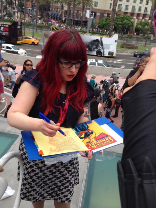 kellysue signing my daughters #1’s and all the amazing folks at the carolcorps meet up doing t