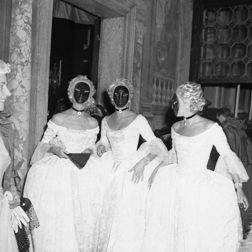 Women dressed in 18th century masquerade costumes for the “Bal Oriental” held in Venice, September 1