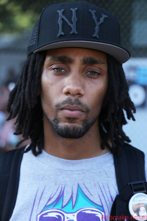 adomakoaman:  Cool guy with beautiful green eyes at #Afropunk