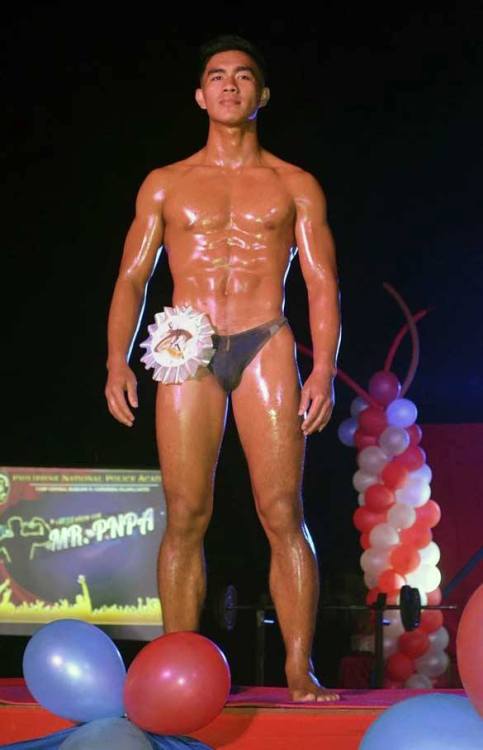 mashitayeah:  Police Officer Chris Comicho Dulagan  Hope he wins Mister Philippines. Igorot with meaty buns. Hihihi. I saw him on duty patrol once in Quiapo, Manila near Plaza Miranda. The first photo i think is taken near the SM outlet store in same