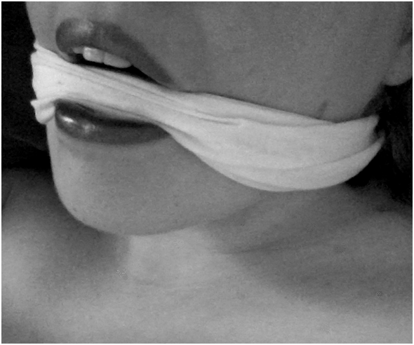 gaggedfantasies:  New selfie - I just love red lips against a white cleave gag :3 